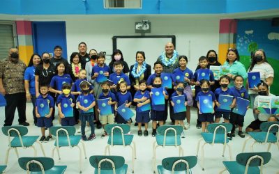 Governor Presents 10,000 Interactive Coastal Education Books to GDOE